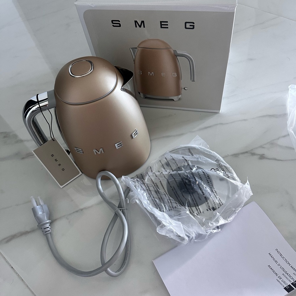 Silver Electric Kettle with Retro Design and Curved Spout